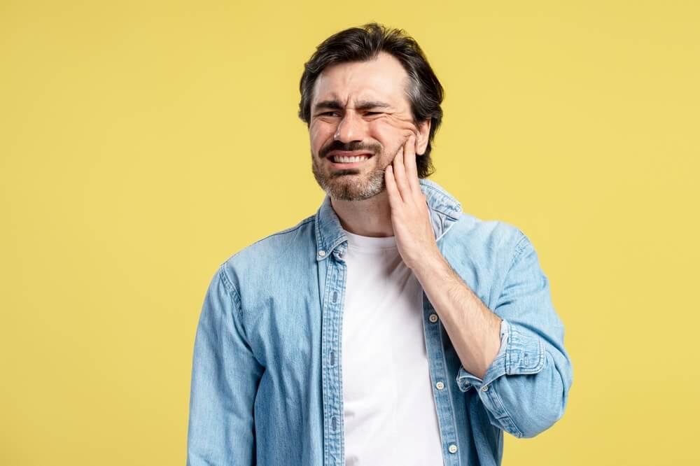 man with tooth nerve pain in Leonardtown MD