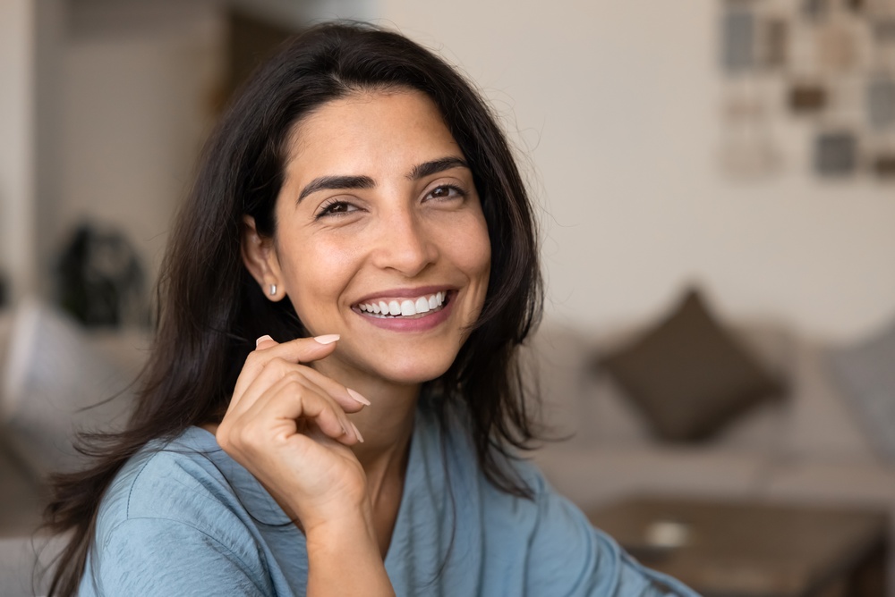 woman after a full mouth restoration in Calvert County