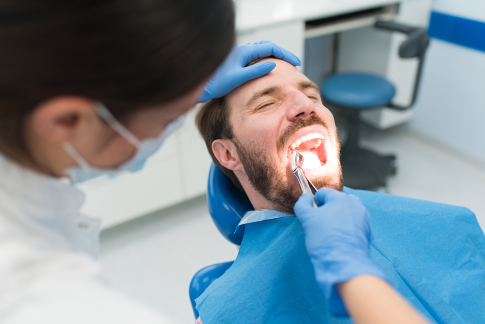 Calvert County emergency dentist pulling tooth same day