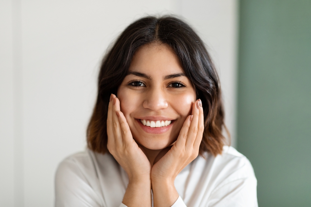 smiling woman after a full mouth reconstruction near Calvert County