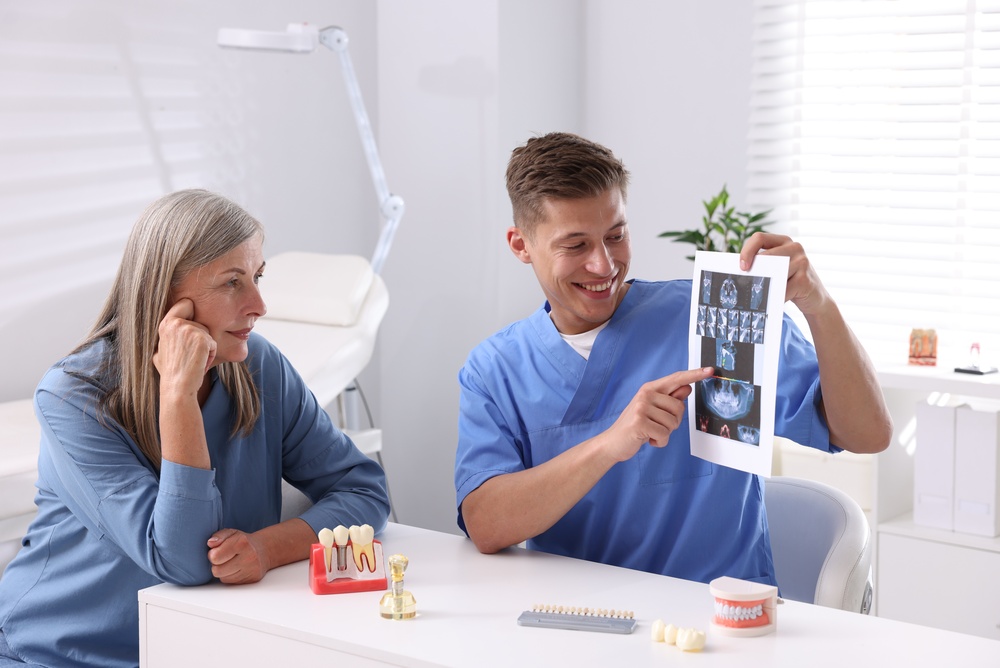talking to dentist about recovery from full mouth reconstruction in Calvert County